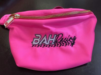 Wear as a crossbody or hip pack. Perfect for race day, concerts, or workouts. Neon, nylon, adjustable strap, and zippered pockets. Buy Now!